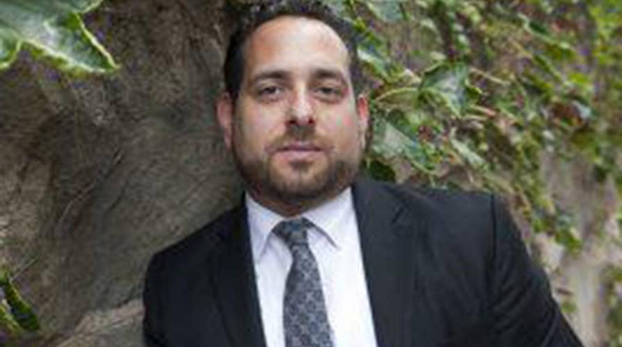 Lawsuit accuses top congressional ethics official of abuse