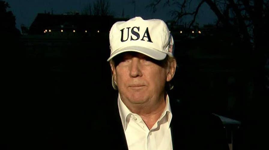 Trump speaks to reporters after return from Camp David