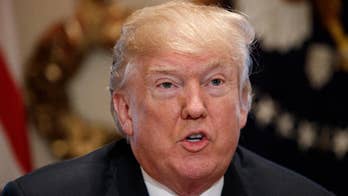 Trump signs tax overhaul, budget bill before heading to Mar-a-Lago