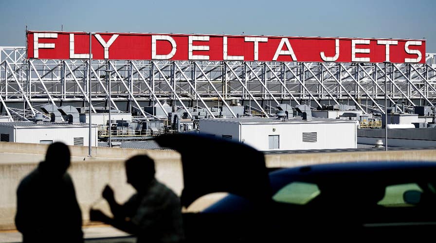 Delta, Atlanta airport debate costs after power failure