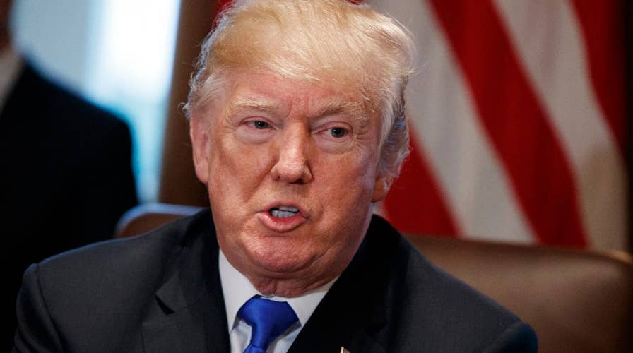 President Trump blasts Russia dossier, slams FBI