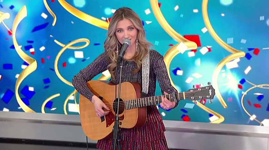 Country singer Sarah Darling performs 'Auld Lang Syne'