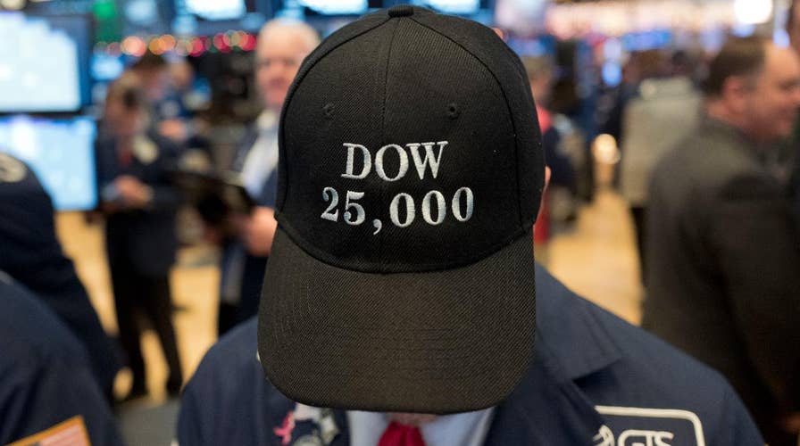 Dow reaches new highs as snow falls