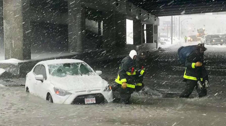 Rivers of ice and slush fill Boston streets