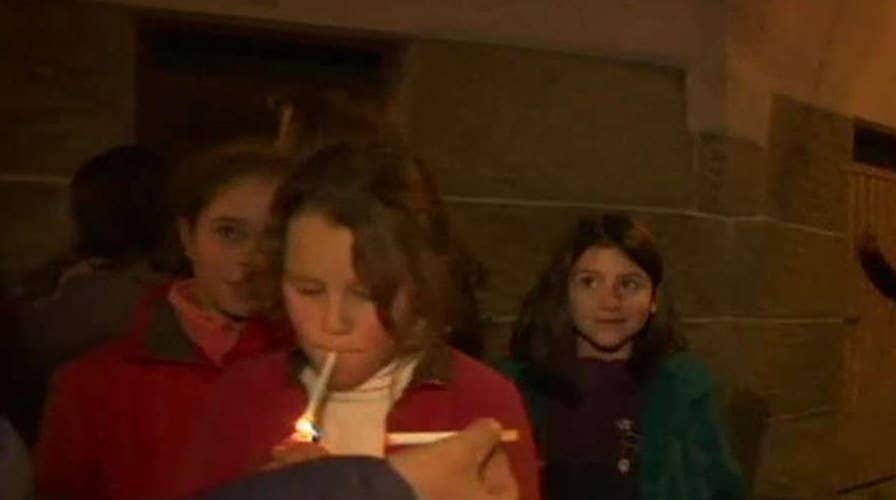 Children encouraged to smoke cigarettes at festival