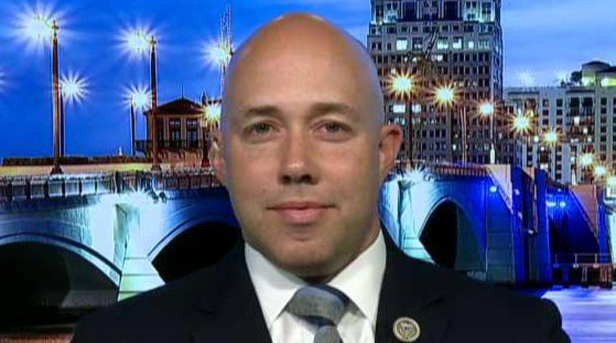 Rep. Mast opens first congressional office in VA facility