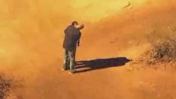 Dramatic high-speed chase ends with a hug, a kiss and two arrests