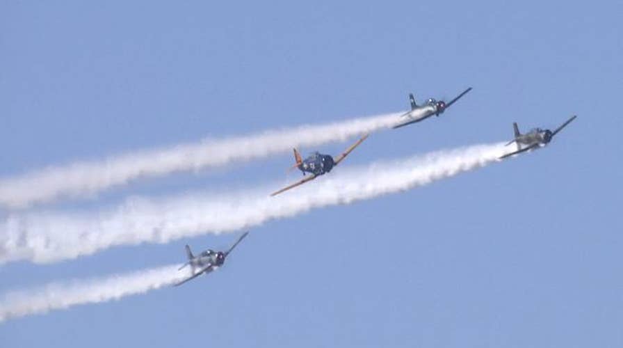 Pilots fly with ex-military planes to honor veterans