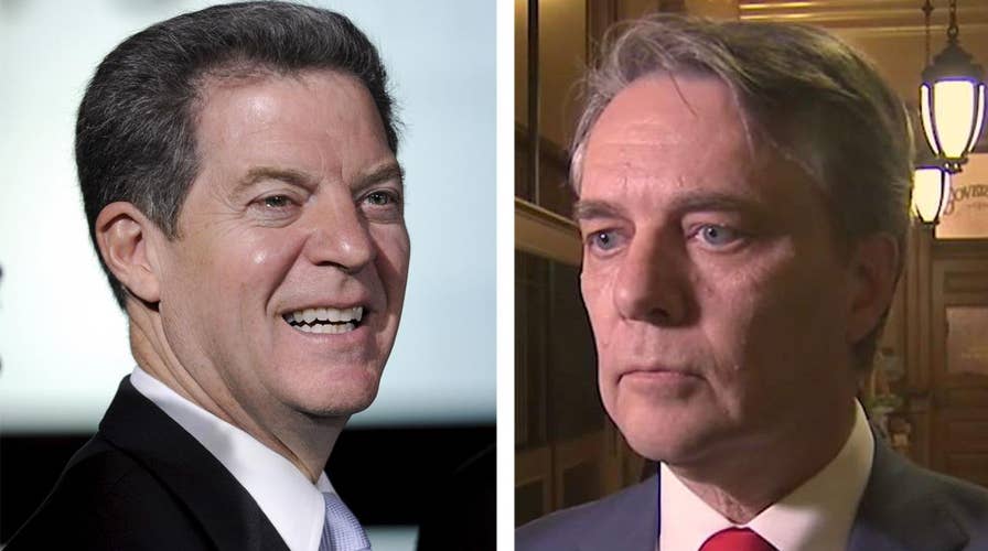 Kansas finds itself between two governors