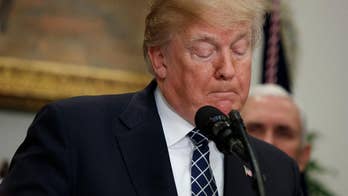 Trump's critics call him racist over 's---hole' controversy