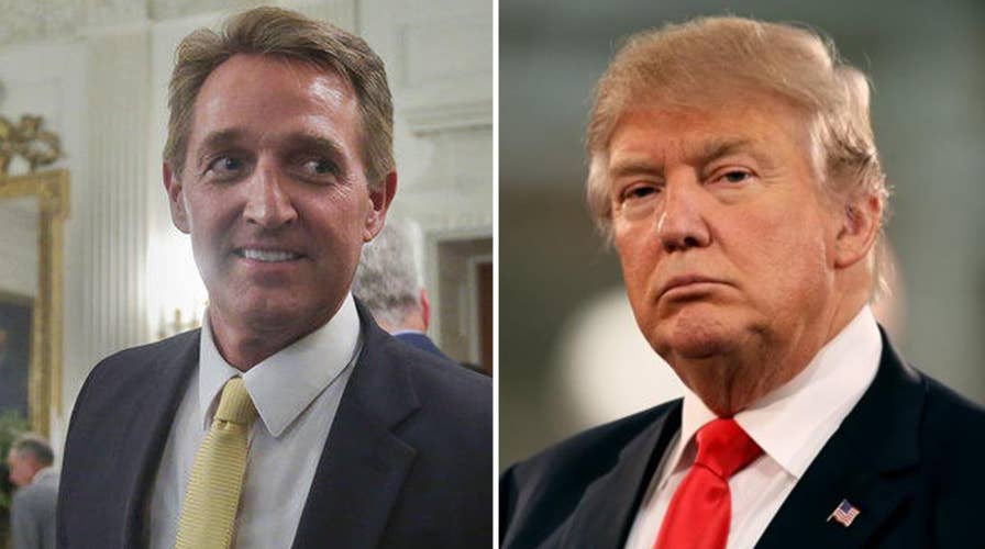 Flake compares Trump's media attacks to Stalin in interview