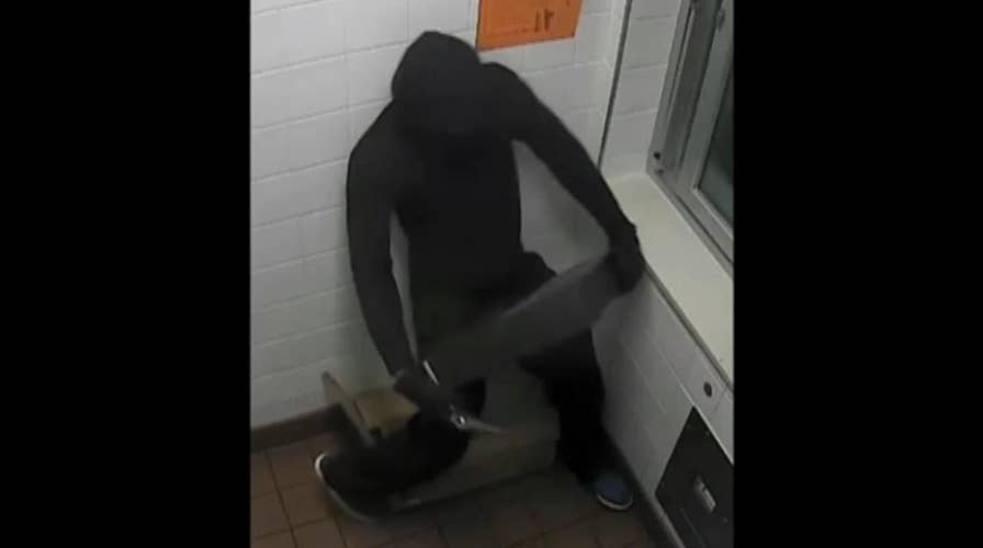Must-see video: McDonald’s burglar flees with entire cash register