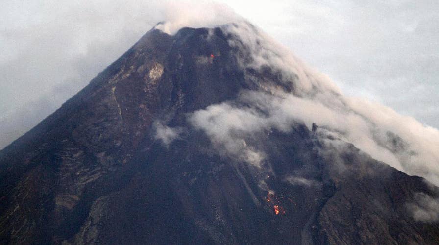 Philippines Mayon volcano spews lava, causes mass evacuations
