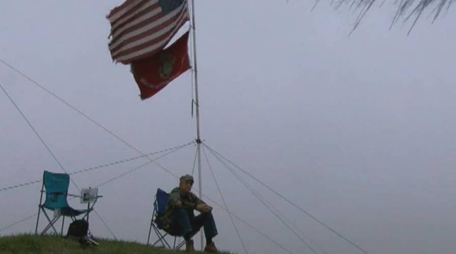 Vietnam vet erects flag memorial along California freeway