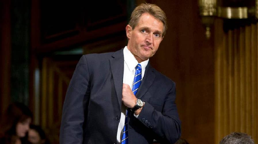 Flake likens Trump to Stalin