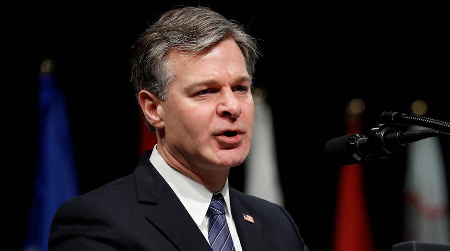 Axios stands by report that FBI's Wray threatened to resign