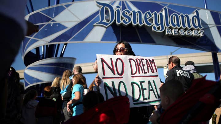 DACA recipients block path to Disneyland in protest