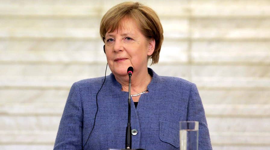 Merkel slams US isolationist polices at World Economic Forum