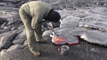 Incredible pics show scientists collecting lava from inside active volcanoes