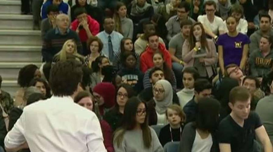 Trudeau corrects woman for using 'mankind' at town hall