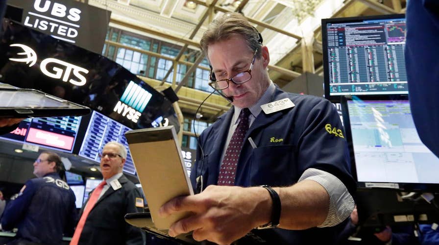 Wild day on Wall Street after Monday's historic point drop