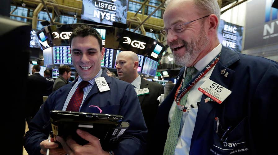 Wall Street erases Monday's losses with a late day rally