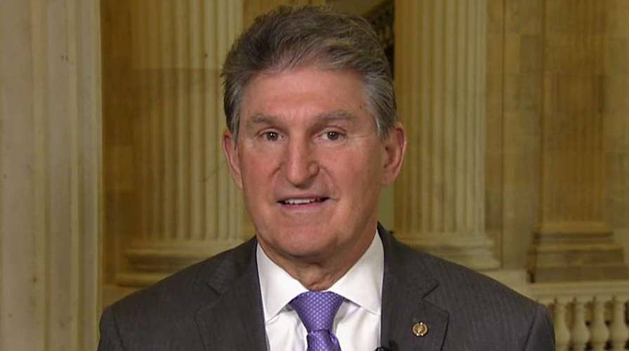 Manchin seeking return to bipartisanship amid tax vote drama