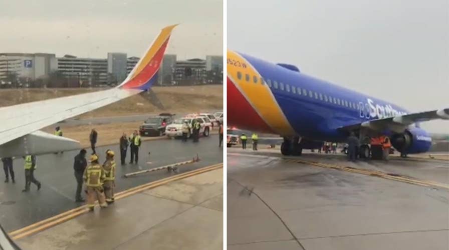 Southwest flight skids off icy runway in Maryland