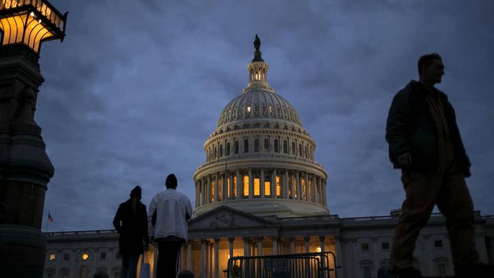 Congress reopens government, gets rid of budget caps