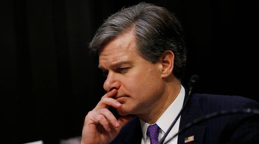 FBI Director Wray on defense during annual threat hearing