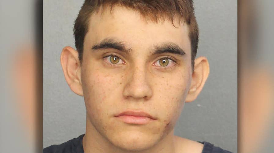 Florida shooting suspect due for first court appearance