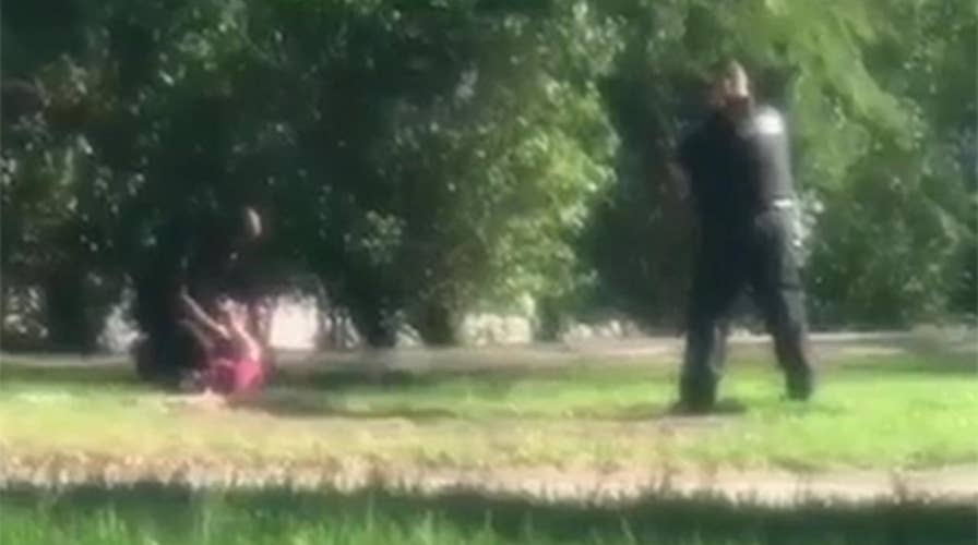 Florida school shooting suspect handcuffed by police