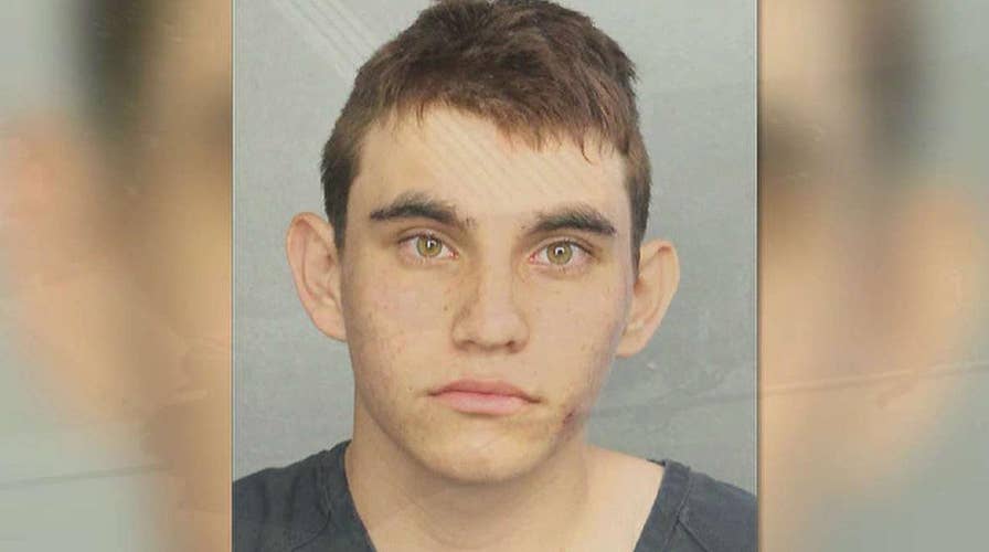 Massacre suspect admits to committing crime, hearing voices