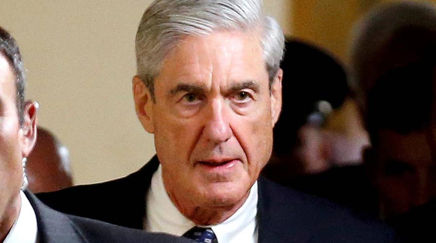 Warning shot at Moscow? Russians charged with interference