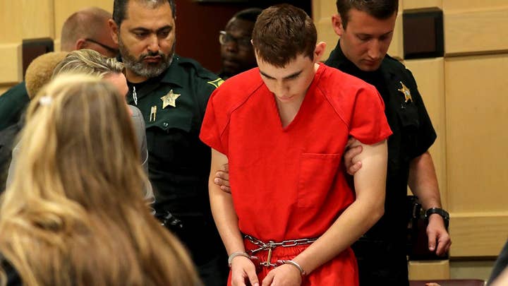 Florida school shooting suspect appears in court
