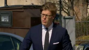 Lawyer linked to ex-Trump adviser pleads guilty to lying to FBI