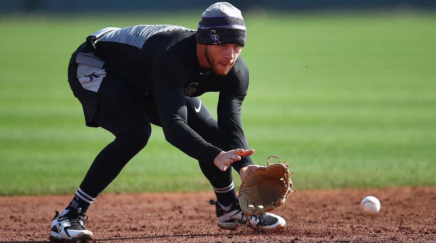 Spring training opens with unseasonable cool temperatures