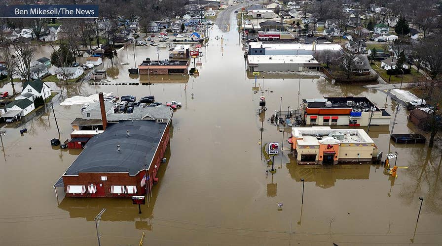 Heavy rains, rapid snowmelt floods huge swath of the Midwest