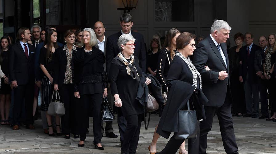 Billy Graham funeral procession arrives in Charlotte, NC