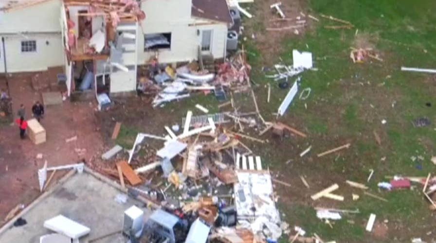 Powerful storm system leaves path of destruction