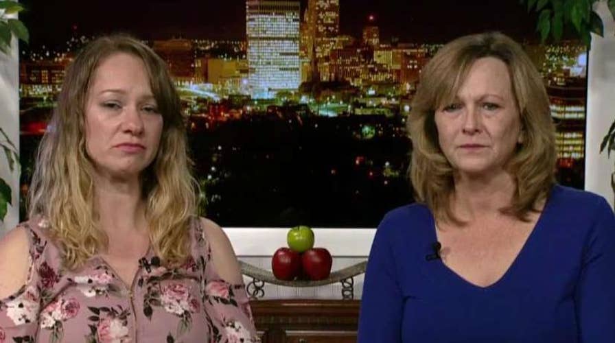 Mother, daughter use handgun to fight off armed robber