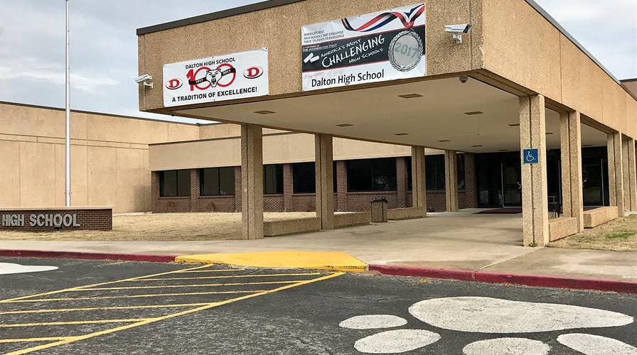 Teacher allegedly fires gun in classroom, taken into custody