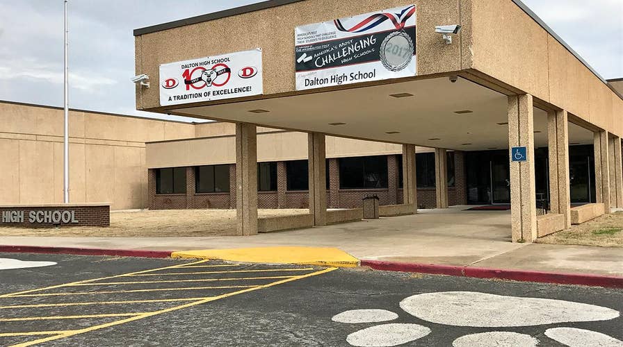 Teacher allegedly fires gun in classroom, taken into custody