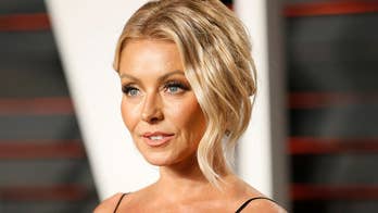 Kelly Ripa, 48, unveils bikini body in skimpy white swimsuit