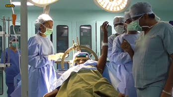 Shocking video shows Parkinson's tremors suddenly stop after surgeon cuts brain pathway