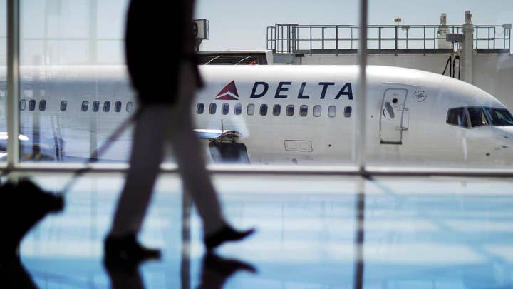 Georgia lawmakers yank tax break for Delta over NRA stance