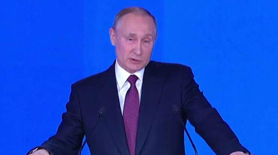 Putin shows off 'invincible' weaponry in address