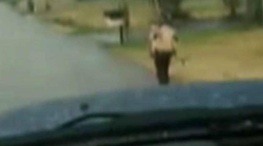 Dad makes son run in the rain for being a bully on bus