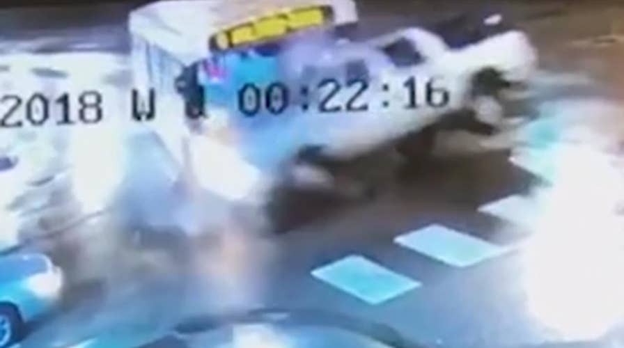 Bus smashes into SUV in dramatic crash caught on camera