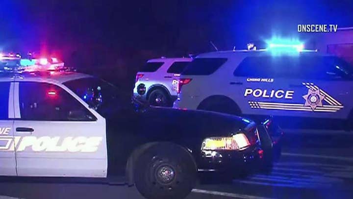 Suspect in custody after two officers shot during standoff